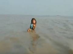 
      
      Video showing Pak journalist standing neck deep in water to...
      
      