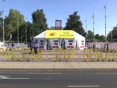 
      
      Geneva: Posters highlighting human rights violations in...
      
      