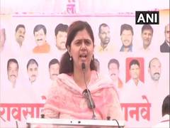 
      
      Maha polls: Pankaja trails in family bastion as cousin...
      
      