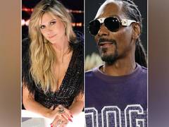 
      
      Heidi Klum reveals she can't stop talking about Snoop Dogg...
      
      