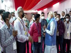 
      
      PM Modi meets workers constructing new Parliament building
      
      