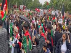 
      
      'Huge protest' rally in London against Taliban's Afghanistan...
      
      