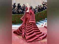 
    Gigi Hadid turns heads in red corset at Met Gala 2022
    