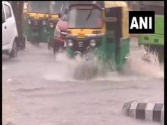 
      
      Heavy rain lashes Delhi-NCR, disrupts  rush hour traffic
      
      