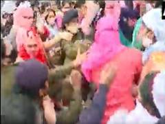 
      
      Scuffle breaks out between police, women reportedly from...
      
      