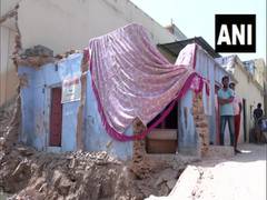 
      
      Houses, temple razed in Alwar: Locals seek compensation
      
      