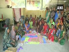 
      
      Women's self-help group in Raipur craft diyas, flower pots...
      
      