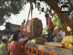
      
      Carved stones being moved from workshop for construction of...
      
      