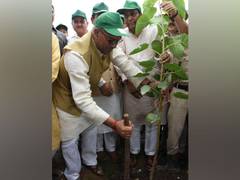 
      
      U'khand CM plants trees on Harela festival, asks people to...
      
      
