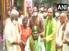 
      
      Brahmotsavam celebrations: Jagan Reddy offers silk cloth to...
      
      