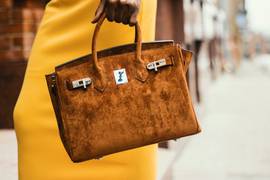 
      
      Miami 'socialite' nabbed for designer-handbag scam 
      
      