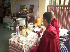 
      
      Shifting to new market after over 40 years, Tibetan traders pray 
      
      