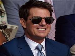 
      
      Tom Cruise takes 'socially-distanced' photos with fans at...
      
      