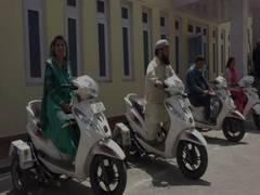 
      
      J-K: Specially designed scooters distributed to physically...
      
      