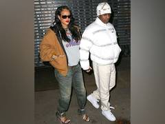 
      
      Rihanna covers baby bump for dinner date with A$AP Rocky
      
      