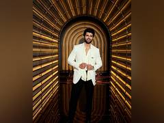 
      
      Vijay Deverakonda looks dapper in white suit
      
      