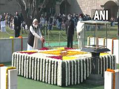 
      
      PM Modi pays floral tribute to Mahatma Gandhi at Rajghat on...
      
      