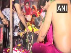 
      
      Devotees across the country throng temples to offer prayers...
      
      