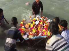 
      
      Devotees bid adieu to Goddess Durga, idols immersed
      
      