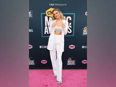 
      
      Kelsea Ballerini tests positive for COVID-19 
      
      