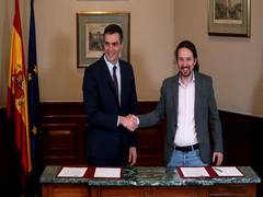 
      
      Spain's ruling Socialists sign coalition deal with Podemos  
      
      