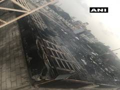 
      
      Fire broke out at Surat building on Thursday, under control 
      
      