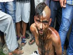 
      
      Indore school teacher thrashed, paraded with half-shaved head...
      
      