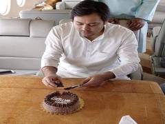
      
      Tejashwi Yadav trolled for sharing picture of himself cutting...
      
      