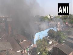 
      
      Billows of smoke still emerge from godown where massive fire...
      
      