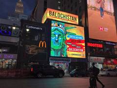 
      
      Billboard at Times Square calls attention to human rights...
      
      