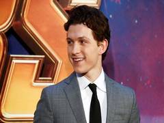 
      
      Tom Holland rescues young fan after she's shoved while...
      
      