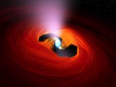 
      
      Ultra-bright X-ray source awakens near a galaxy not so far away
      
      