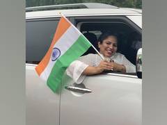 
      
      Indian-Americans celebrate drive-thru Independence Day 
      
      