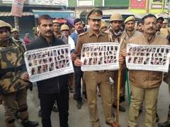 
      
      Police paste photographs of stone-pelters in Gorakhpur
      
      