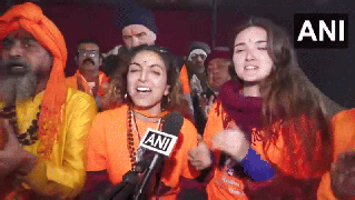 
      
      Foreign devotees flock to Triveni Sangam for first Amrit Snan
      
      