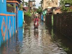 
      
      West Bengal: Rainwater enters houses in Siliguri, leaves...
      
      