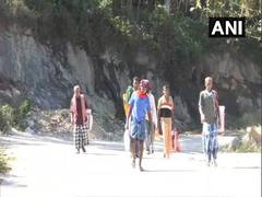 
      
      Kerala: Migrant workers set out for home on foot amid...
      
      
