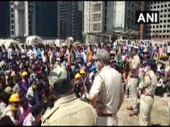 
      
      Workers protest, pelt stones at Diamond Bourse office in Surat
      
      