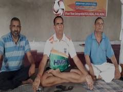 
      
      Retired soldier balances ball on head, sets record on Yoga Day
      
      