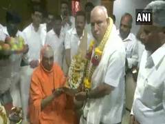 
      
      Karnataka: Yediyurappa meets Shivarathri Deshikendra...
      
      