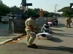 
      
      In Pune, police round up morning walkers make them do Yoga...
      
      
