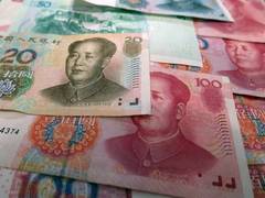 
      
      Chinese yuan weakens further, rating fixed closer to 7 a dollar  
      
      