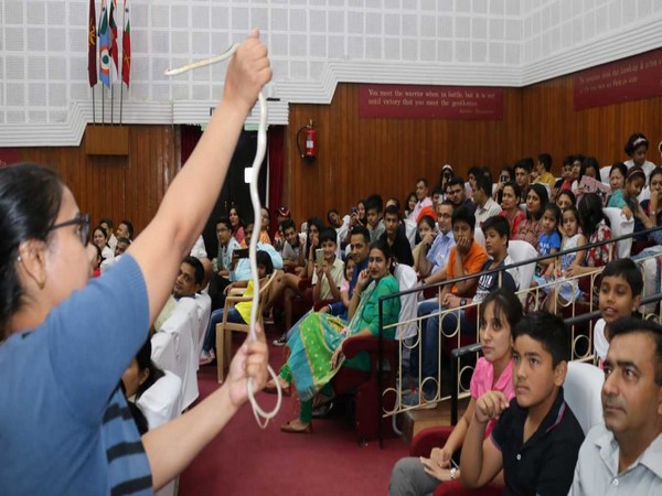 Children and parents taking part in the “Friends of Snake's Society
