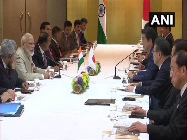 Prime Minsiter Narendra Modi with his Japanese counterpart Shinzo Abe during a meeting on Thursday in Osaka, Japan (Photo/ANI)