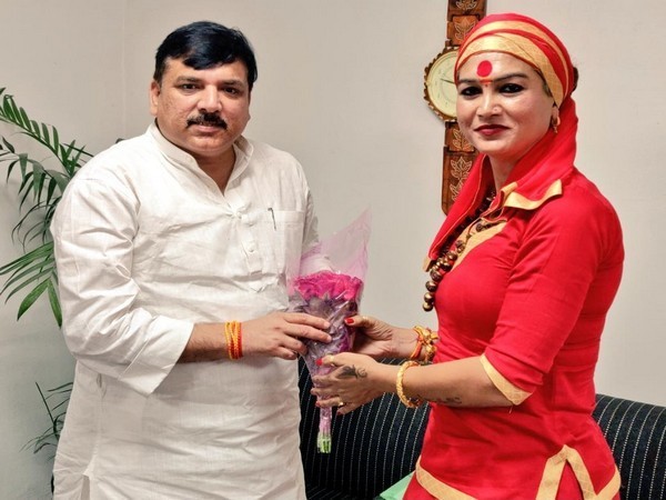 AAP leader Sanjay Singh with Mahamandaleshwar Bhawani Nath Valmiki at Prayagraj on Friday.  