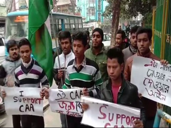 ABVP members showing placards in support of the CAA in Siliguri on Friday. Photo/ANI