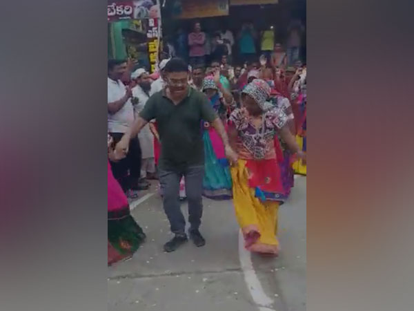 Sattenapalli YSRCP MLA Ambati Rambabu dancing during Bhogi celebrations in Guntur on Friday. (Photo/ANI)