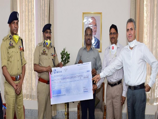 Jammu and Kashmir DGP Dilbag Singh handed over a cheque of Rs 9.47 crore to LG Girish Chandra Murmu on Wednesday.