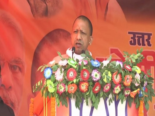Uttar Pradesh Chief Minister Yogi Adityanath addressing a poll rally in Katihar on Wednesday.