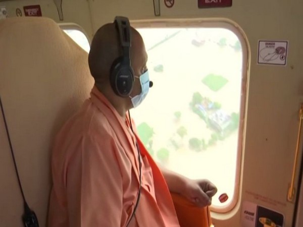 Uttar Pradesh Chief Minister Yogi Adityanath conducting an aerial survey in Ghazipur on Friday. (Photo/ANI)